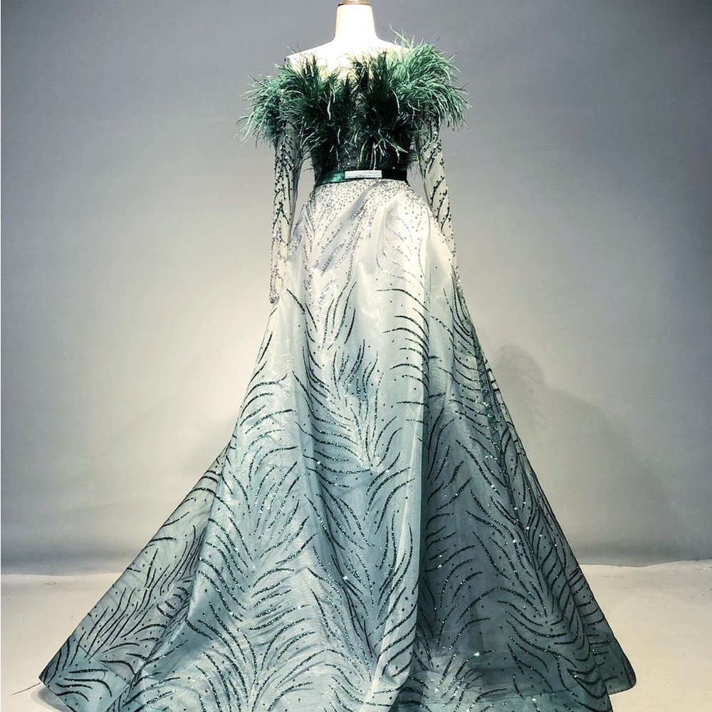 Green feathered custom gown